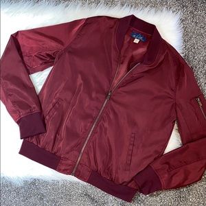 Francesca’s maroon bomber jacket